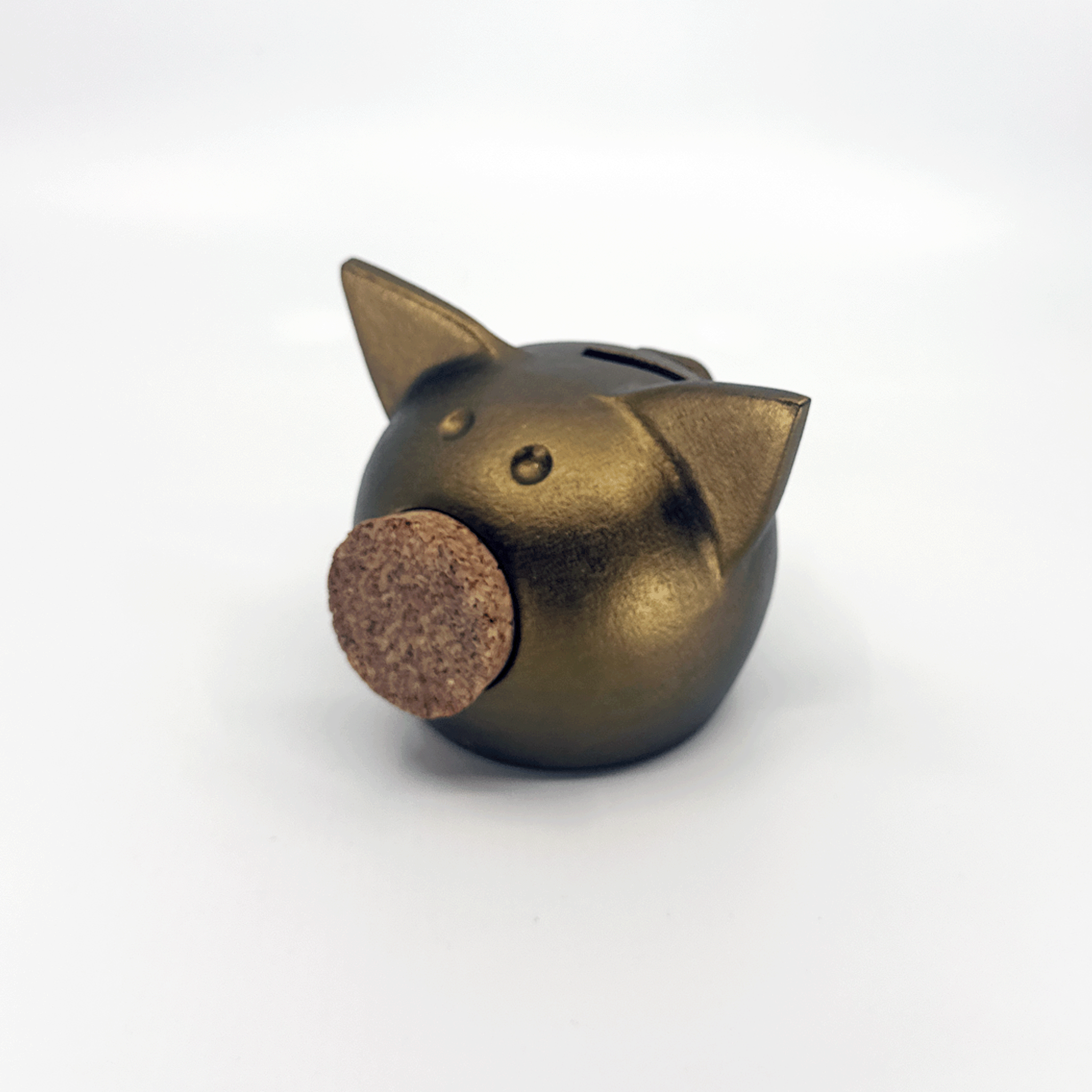 Handmade ceramic piggy bank in a metallic autumn hue with a natural cork snout