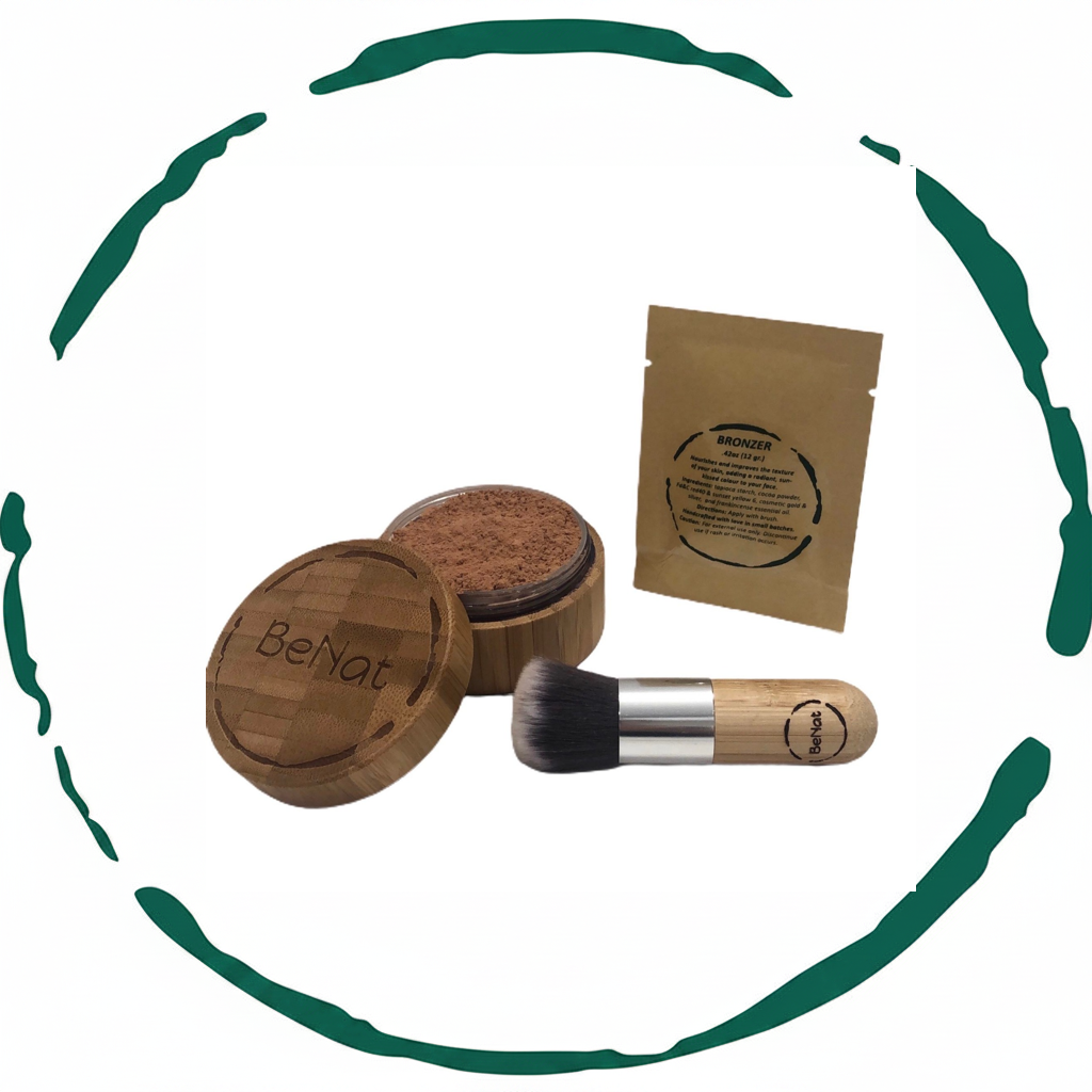Bronzer loose powder set with bamboo container, kabuki brush, and eco-friendly kraft bag refill.