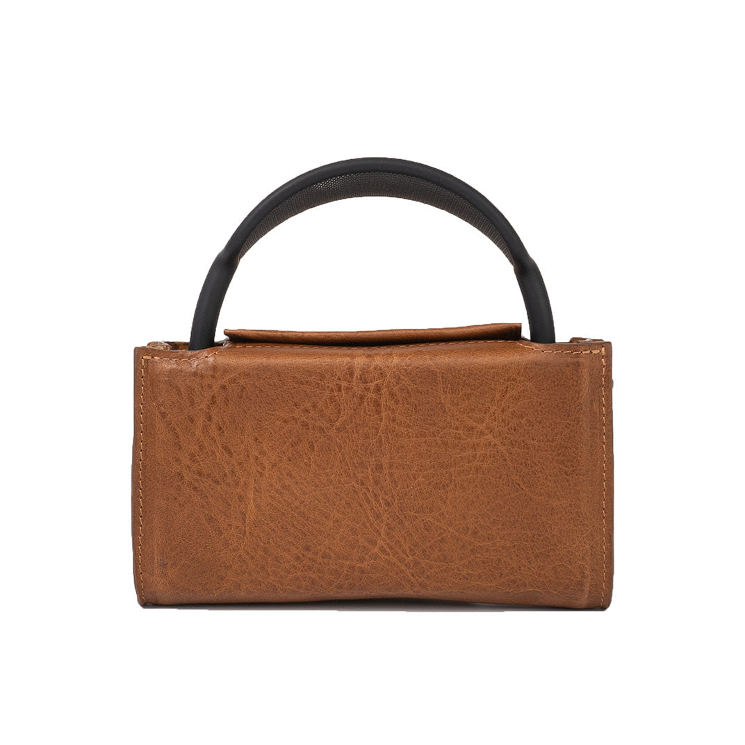Leather AirPods Max case with adjustable crossbody strap in premium full-grain vegetable-tanned Italian leather