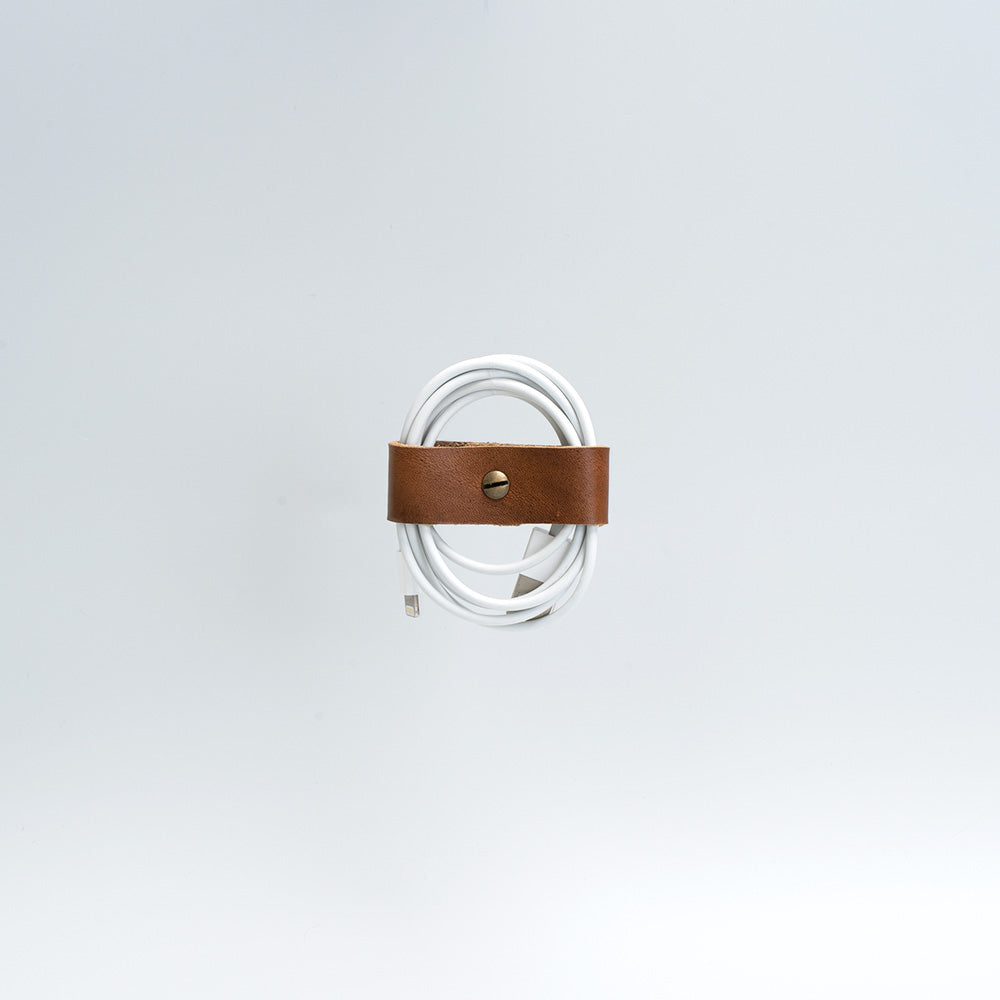 Handcrafted vegetable tanned leather cord organizer for charging cables in minimalist style — view 5