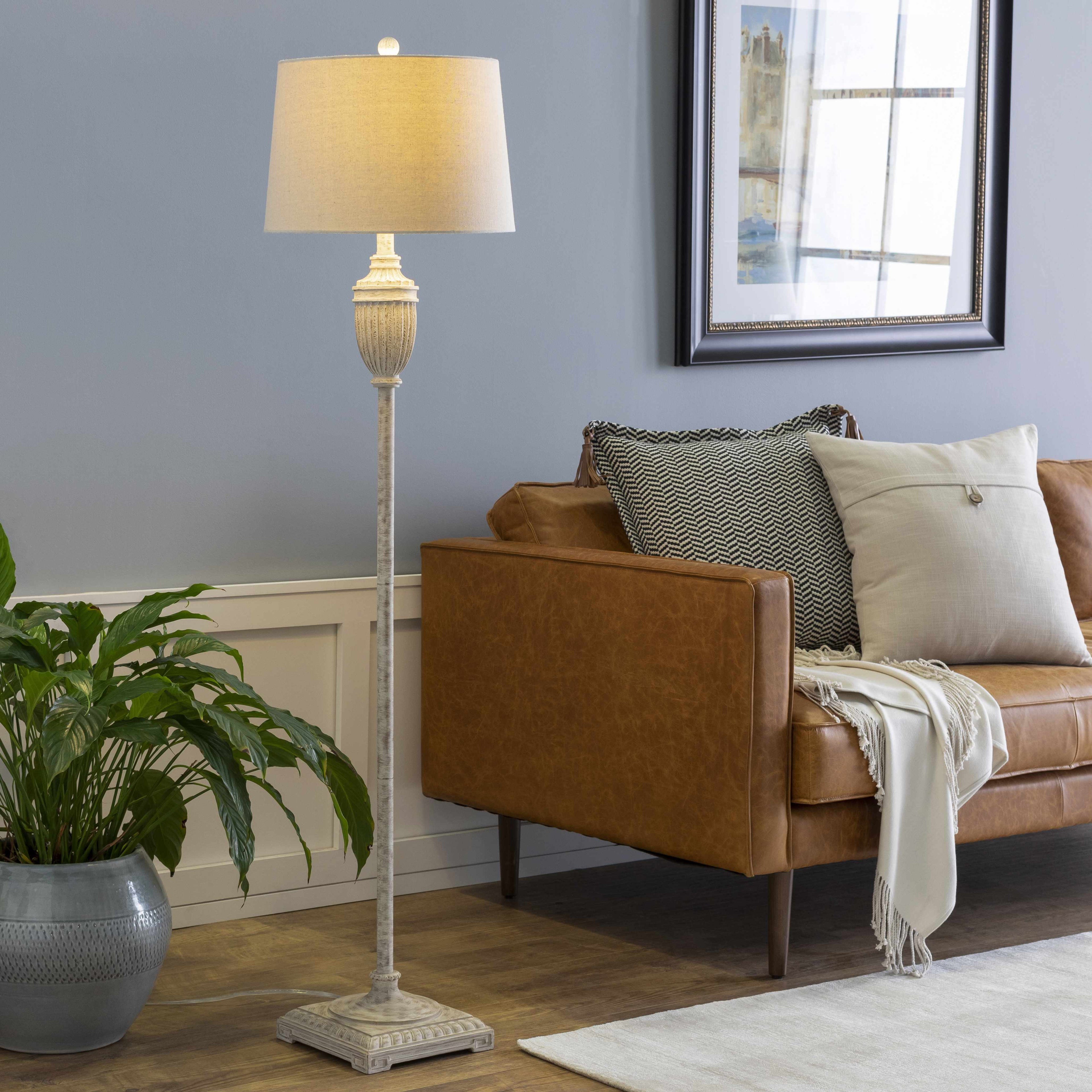Traditional floor lamp featuring a detailed gray resin base and a classic white linen lamp shade — view 2