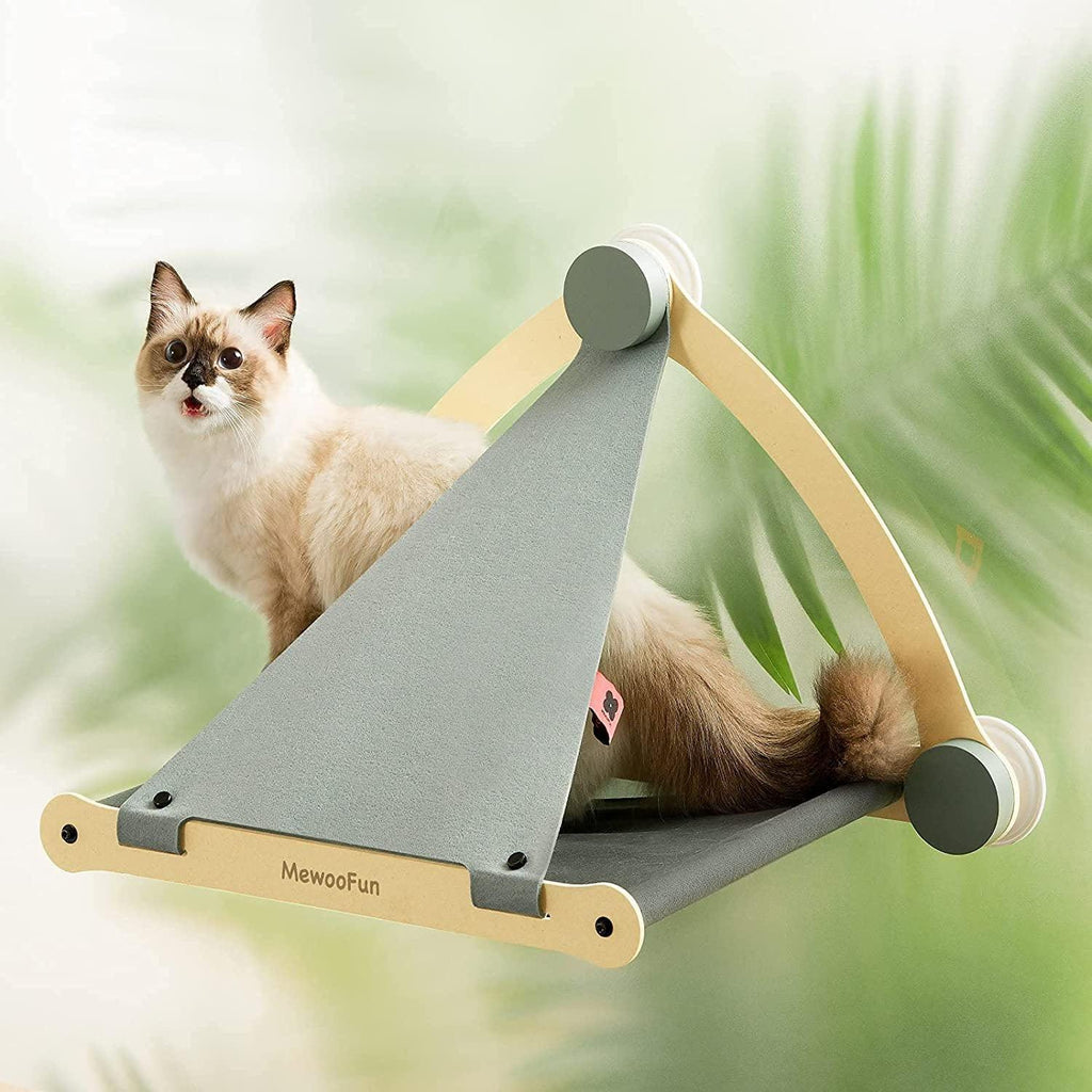 Wooden cat hammock window seat with breathable canvas mat attached to glass using suction cups