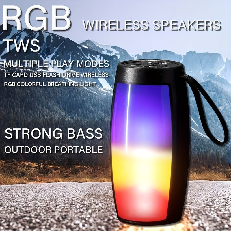 Compact black wireless Bluetooth speaker with vibrant glowing RGB LED lights and 360-degree audio output — view 2