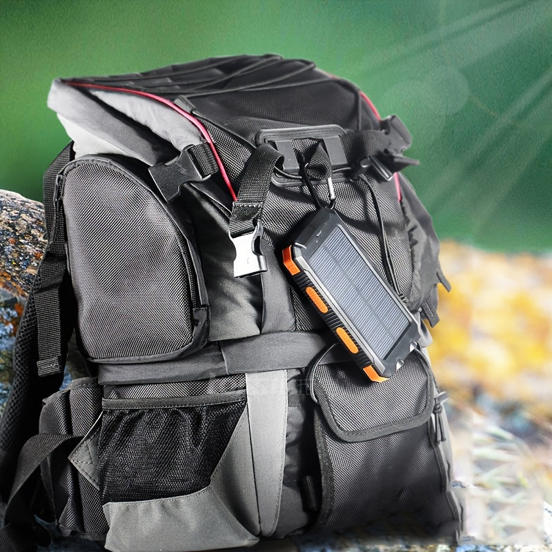 Orange 10000mAh portable solar power bank with dual USB ports and LED flashlight for outdoor camping. — view 3