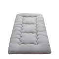 Grey foldable tatami floor futon mattress pad featuring a soft quilted surface for versatile use.