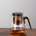 Glass teapot with walnut wood handle and one-click filter for brewing loose leaf tea