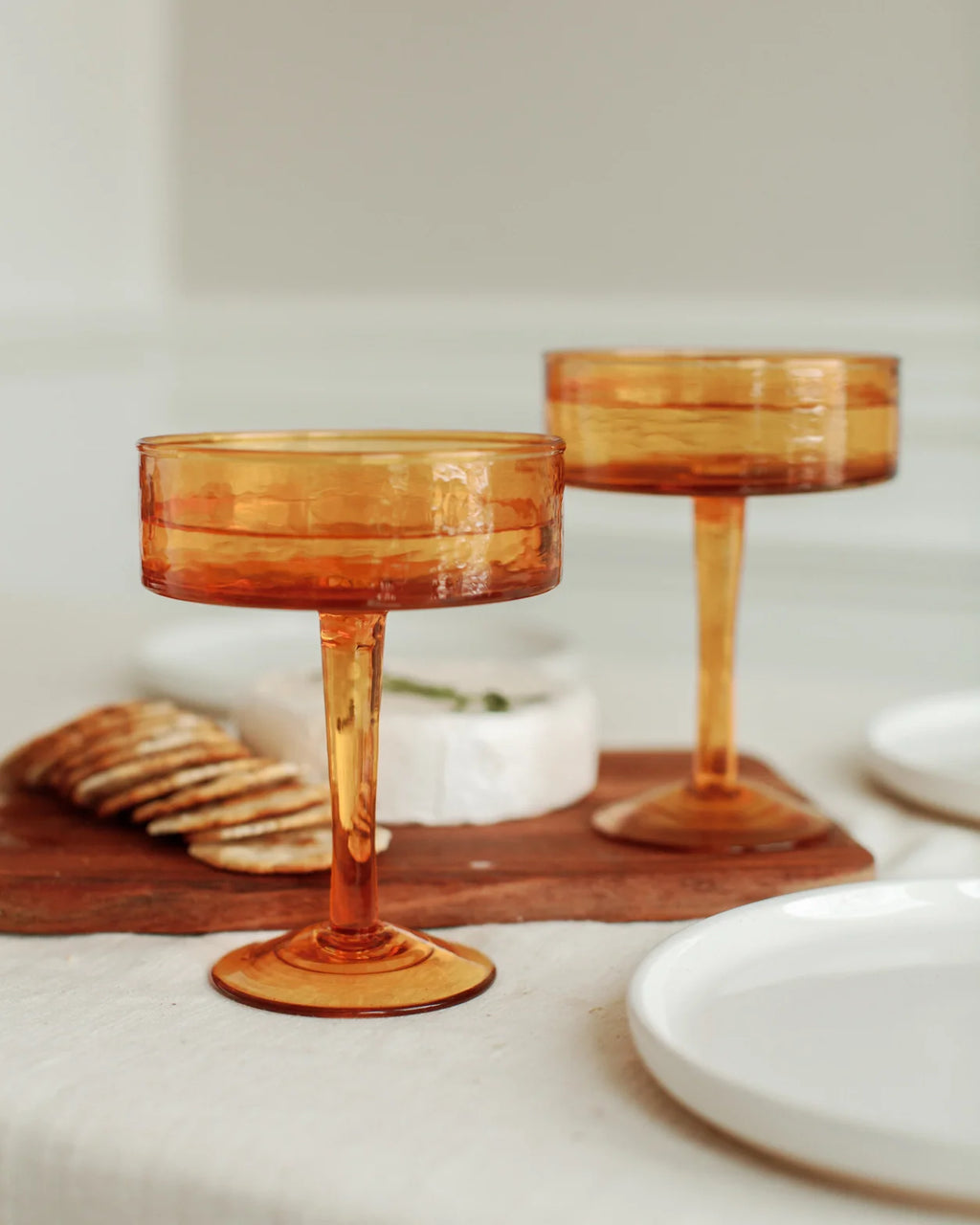 Handblown hammered coupe cocktail glass pair crafted from beautifully textured colored recycled glass. — view 3