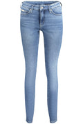Calvin Klein women's blue denim jeans, mid-rise skinny fit with five pockets and washed effect