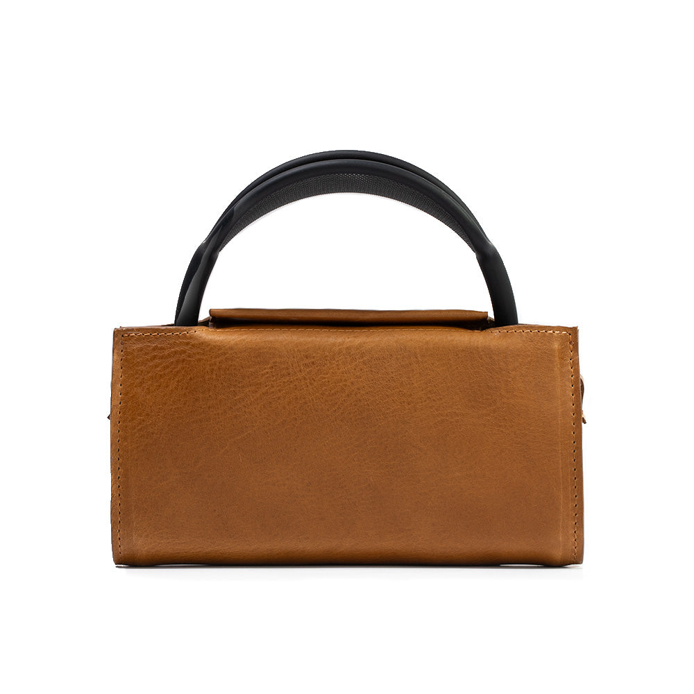 Leather AirPods Max case with adjustable crossbody strap in premium full-grain vegetable-tanned Italian leather — view 3