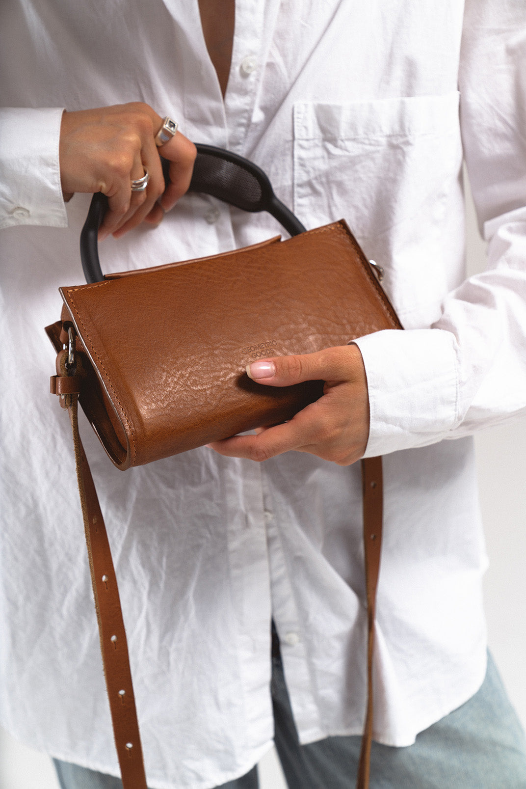 Leather AirPods Max case with adjustable crossbody strap in premium full-grain vegetable-tanned Italian leather — view 2