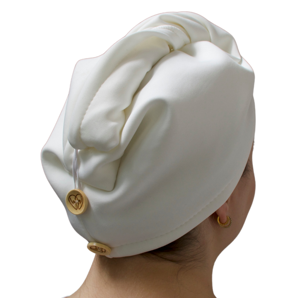 Organic cotton castor oil hair wrap with waterproof outer layer for mess-free deep conditioning treatments