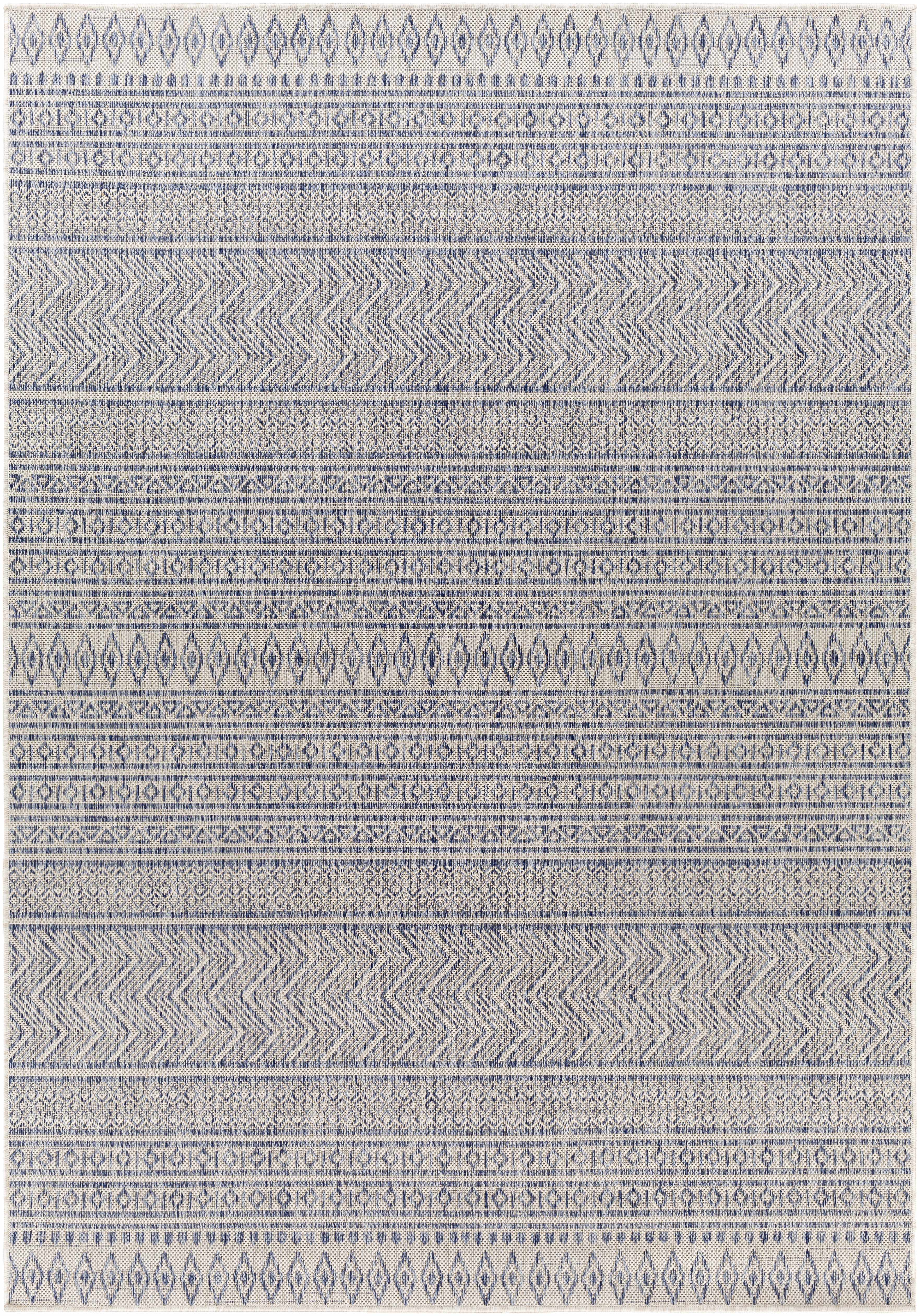 Madras navy blue and gray bohemian performance outdoor area rug in a low profile rectangular shape