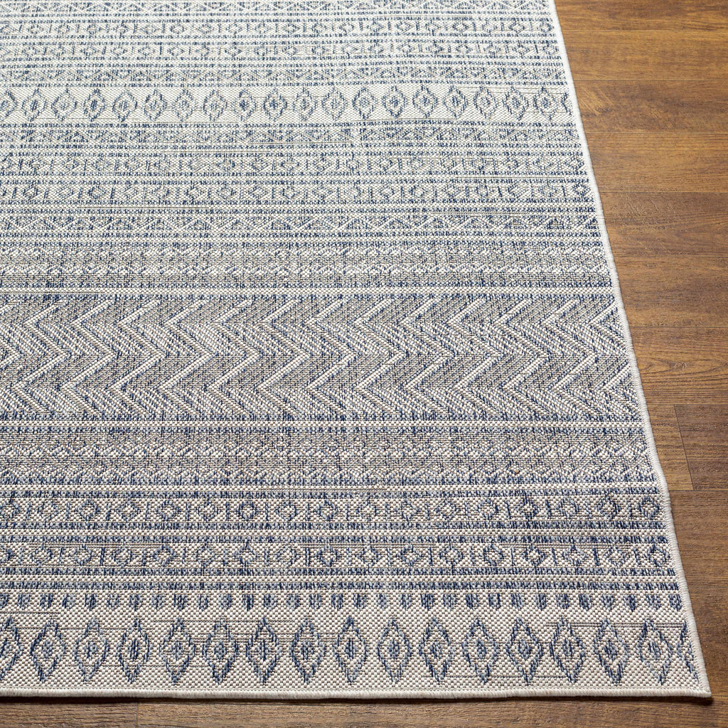 Madras navy blue and gray bohemian performance outdoor area rug in a low profile rectangular shape — view 5