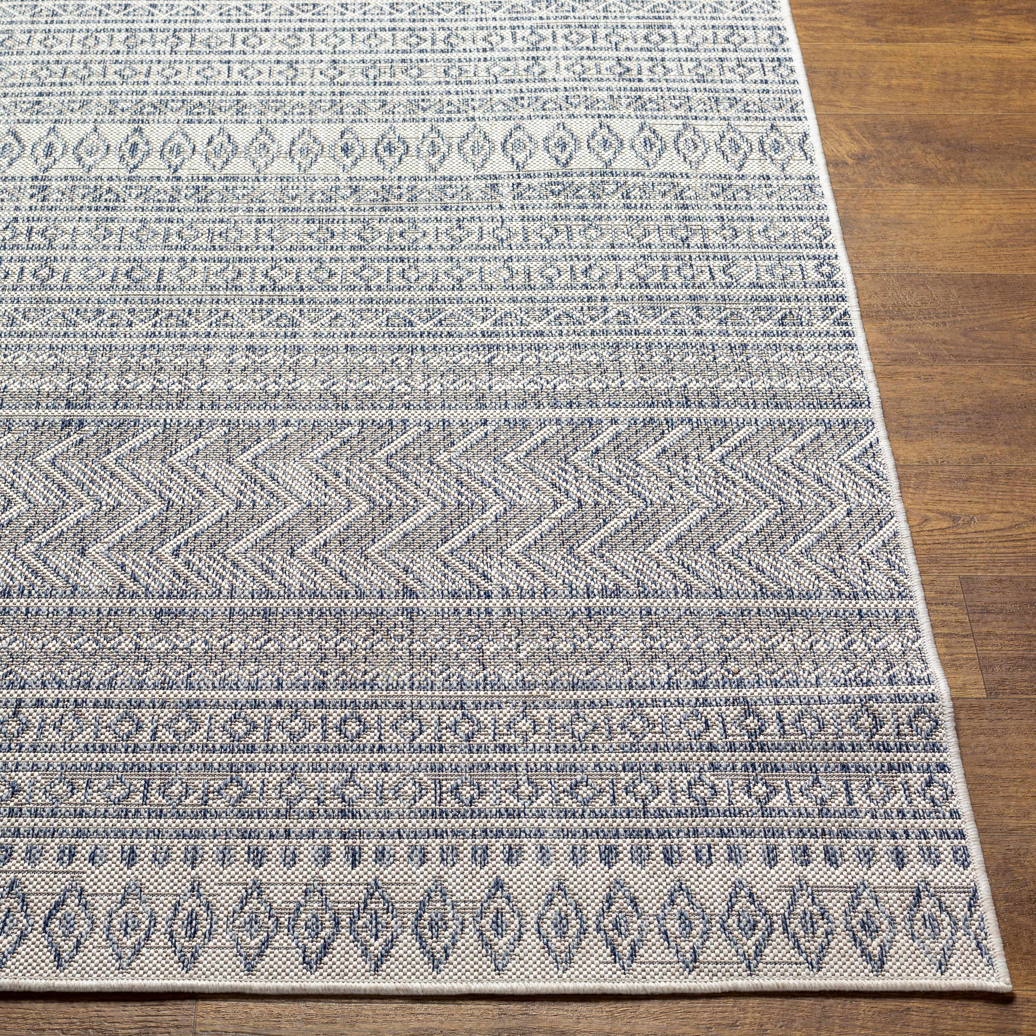 Madras navy blue and gray bohemian performance outdoor area rug in a low profile rectangular shape — view 5