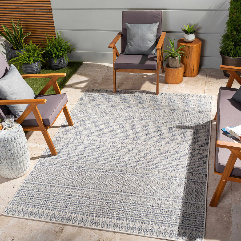 Madras navy blue and gray bohemian performance outdoor area rug in a low profile rectangular shape — view 2