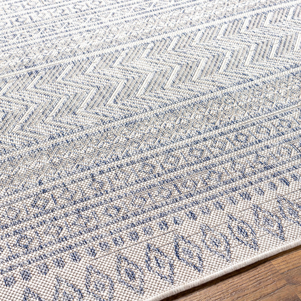 Madras navy blue and gray bohemian performance outdoor area rug in a low profile rectangular shape — view 4