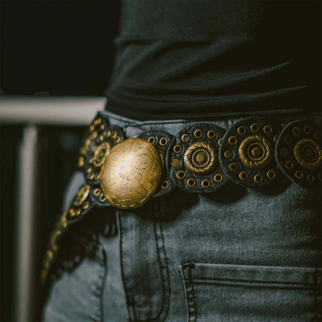 Rona handcrafted full-grain leather belt featuring rounded elements and an aged copper buckle — view 5