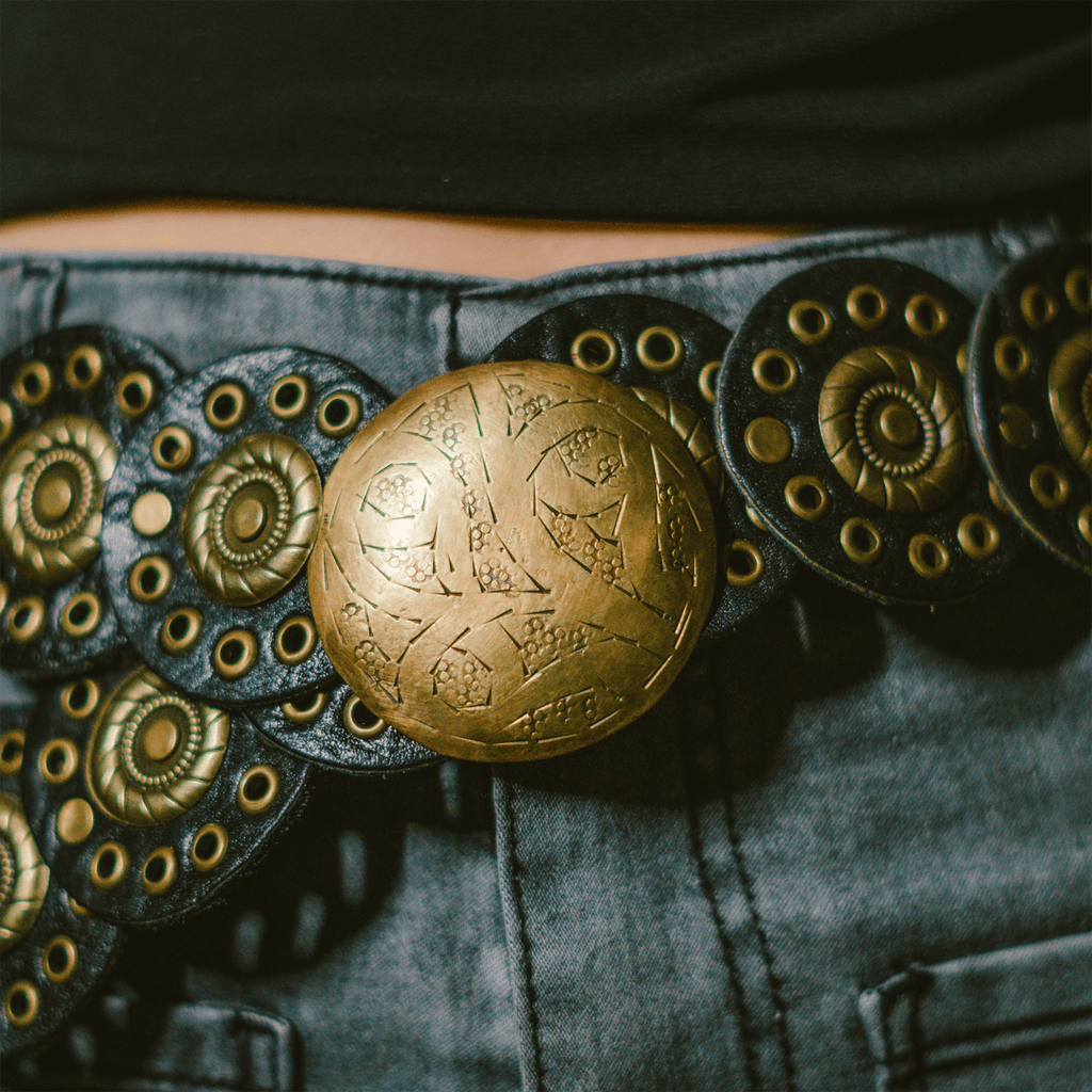 Rona handcrafted full-grain leather belt featuring rounded elements and an aged copper buckle — view 2