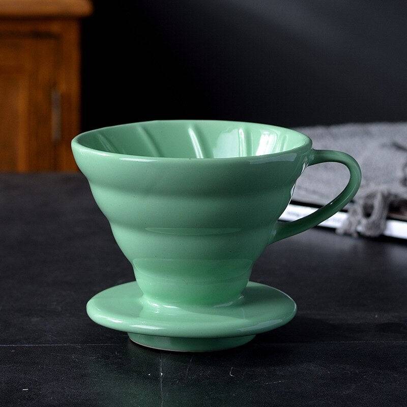 Pour over coffee dripper featuring a reusable stainless steel mesh filter and angled cone design — view 4