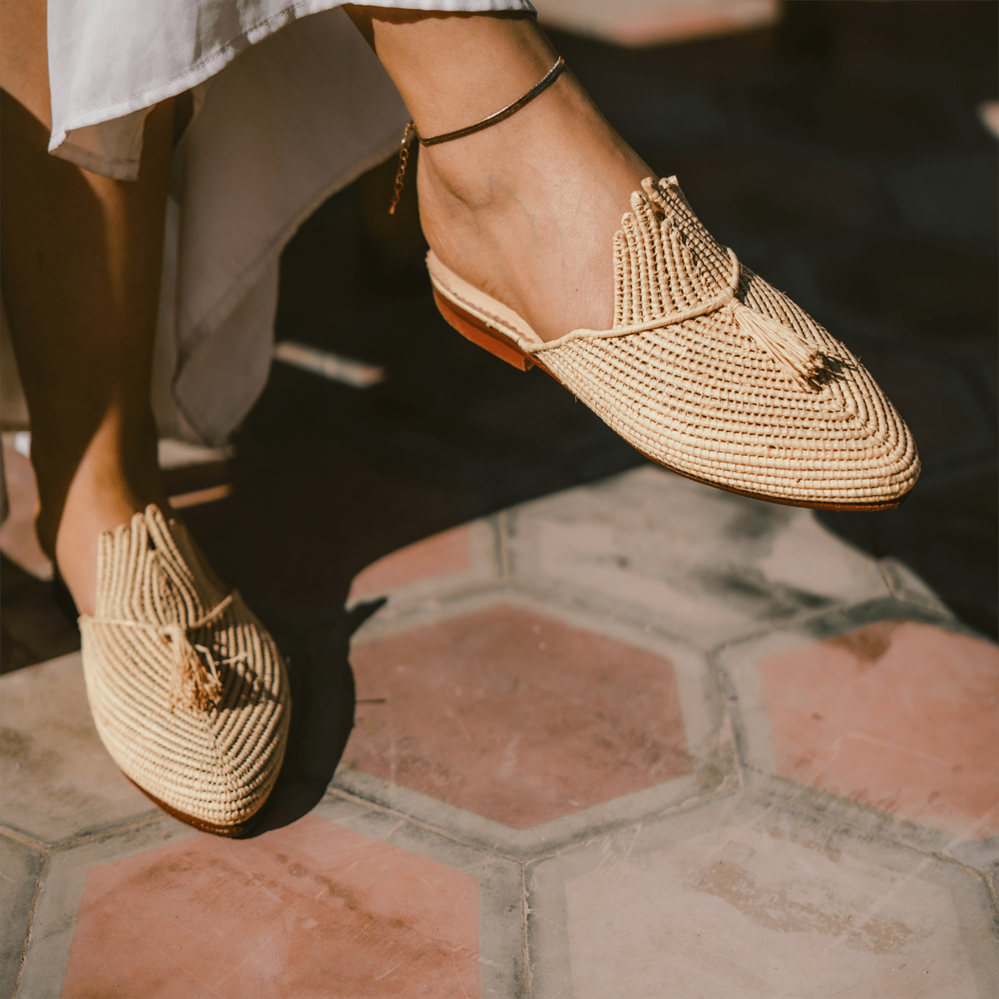 Handcrafted Ladame raffia slippers with woven textured upper and durable leather sole — view 3