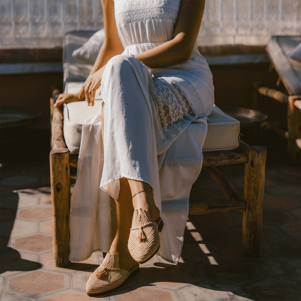 Handcrafted Ladame raffia slippers with woven textured upper and durable leather sole — view 4