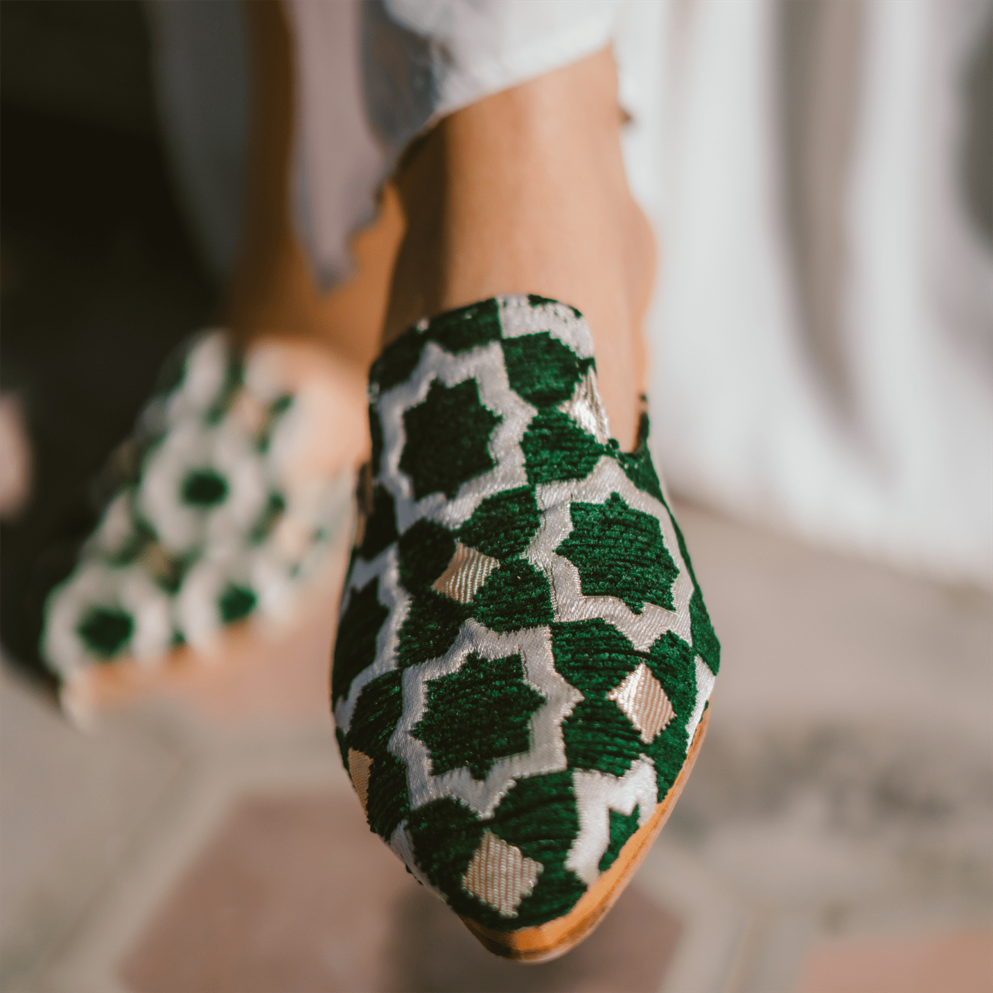 Handcrafted premium leather Moroccan Tamghra slippers featuring a thick cushioned sole and intricate forged design