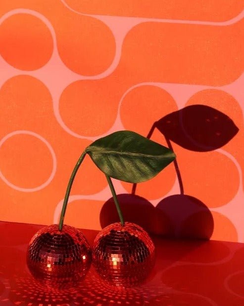Two connected cherry disco balls covered in sparkling silver glass mosaic tiles — view 4