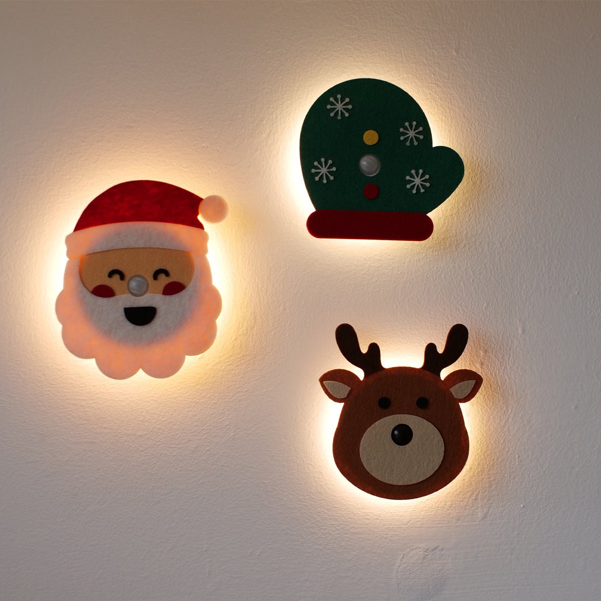 Festive Christmas motion sensor night light featuring soft felt holiday shapes and indirect LED glow