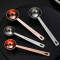 Stainless steel coffee scoop measuring spoon in silver and rose gold with engraved handle