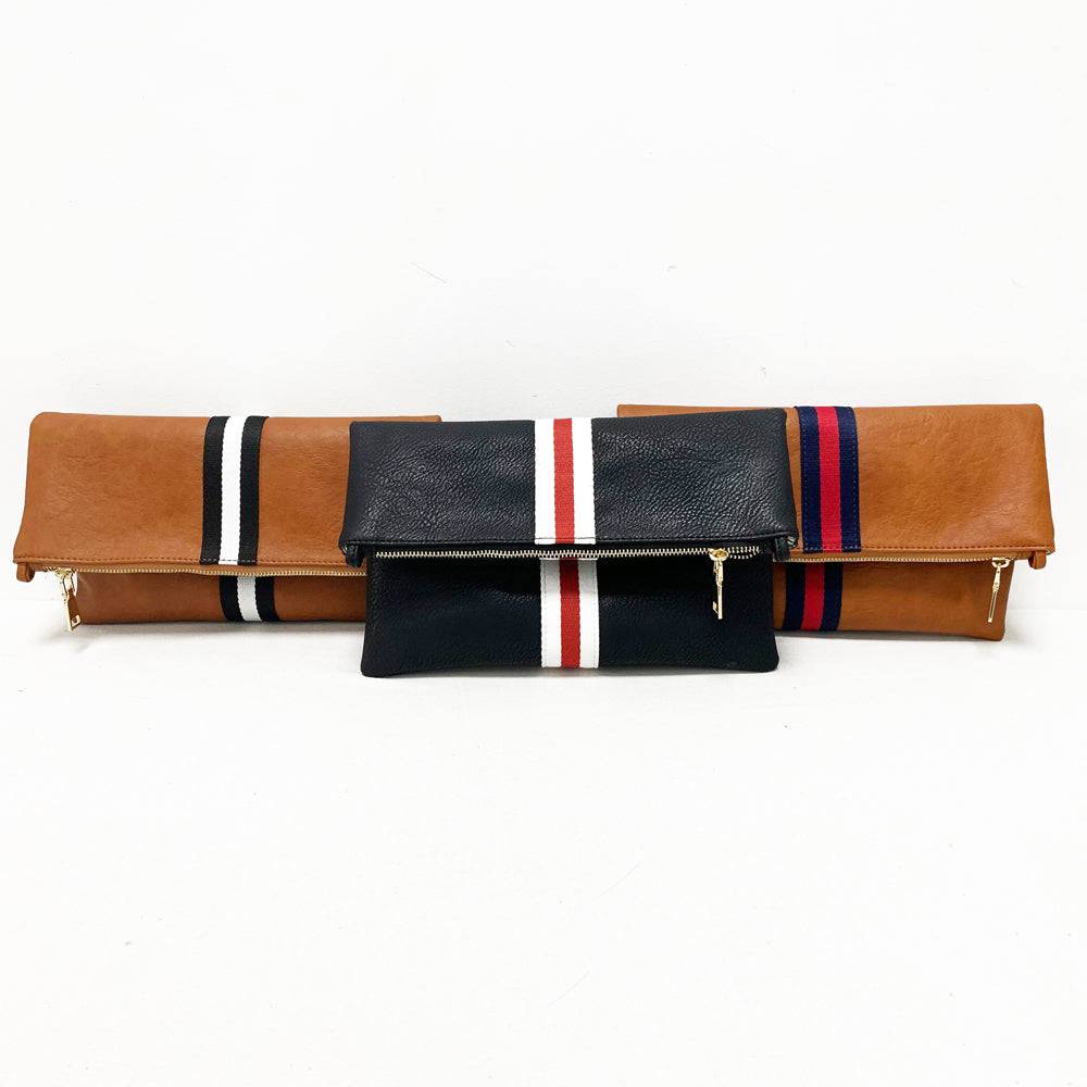 Vegan leather fold over clutch bag with accent stripe and removable braided woven shoulder strap — view 3