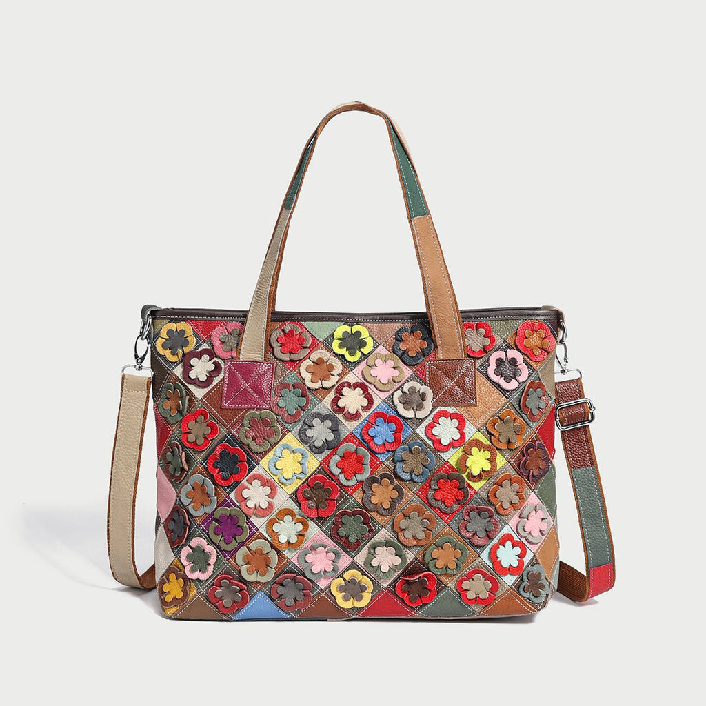 Colorful hippie floral patchwork leather tote bag with 3D flower appliqués and crossbody strap