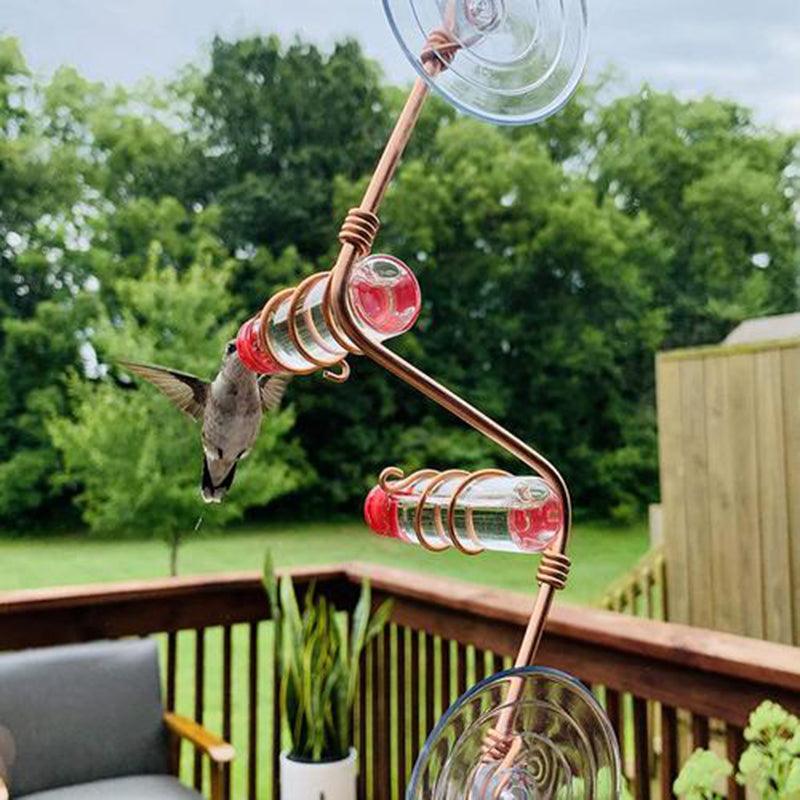 Handmade copper wire hummingbird feeder with clear nectar bottles and suction cups — view 5