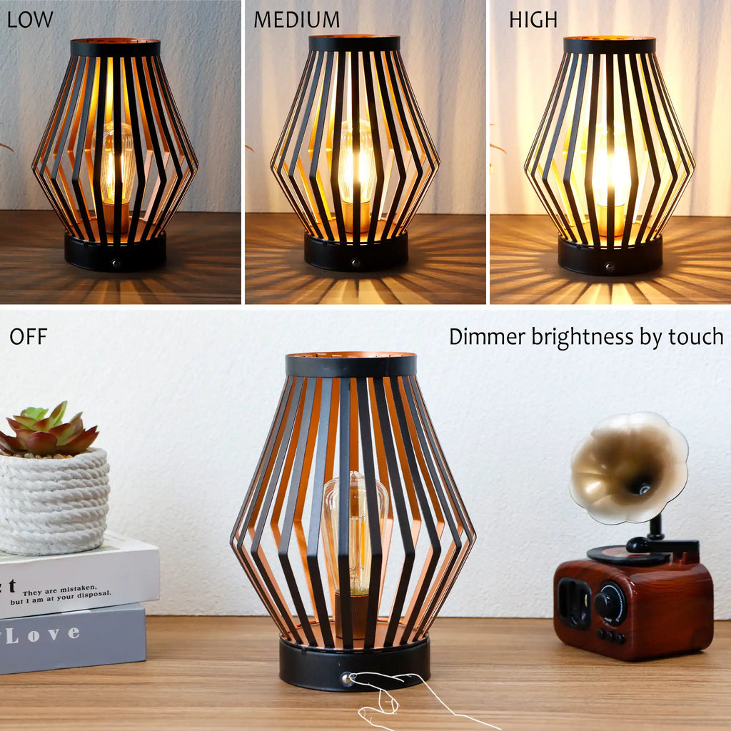 Set of two vintage bronze metal cage table lamps with warm glowing bulbs — view 4