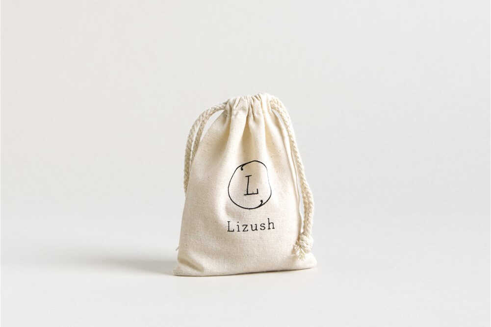 Natural nipple balm in 2 oz jar with reusable cotton bag for soothing breastfeeding relief — view 4