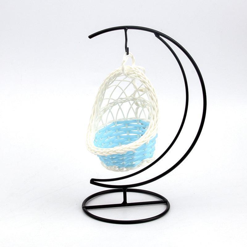 Cozy Haven plastic bird swing with sturdy iron frame base in a neutral color