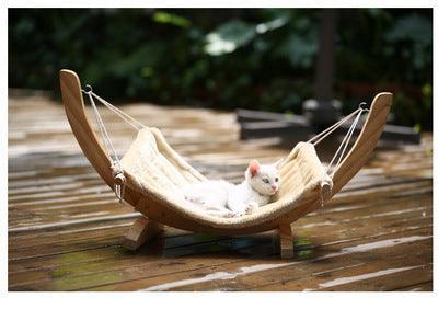 Cozy Paws wooden cat hammock bed with plush fabric resting surface and sturdy wall mounting