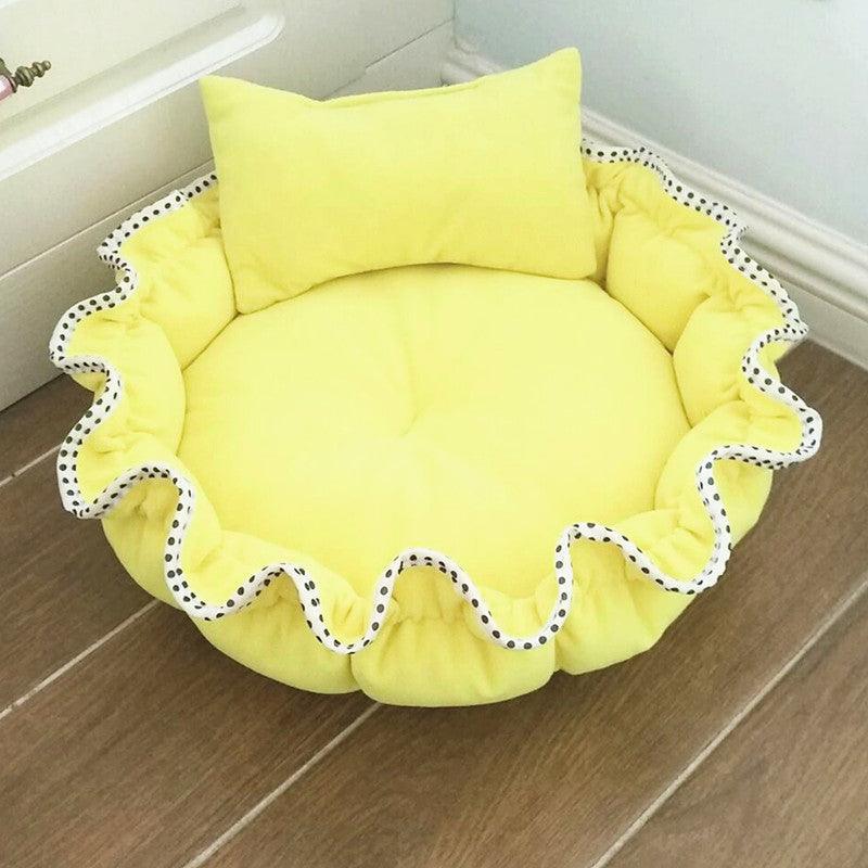 Yellow floral bud shaped polar fleece dog bed with a matching plush pillow for neck support. — view 3