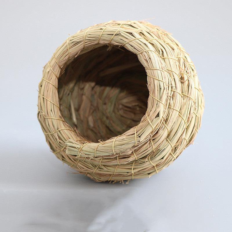Hand-woven natural straw bird nest providing a cozy and warm retreat for small pets — view 5