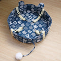 CozyCat cotton cat hammock bed in a square fabric design for comfortable feline window lounging