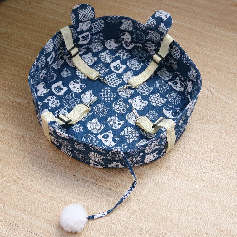 CozyCat cotton cat hammock bed in a square fabric design for comfortable feline window lounging