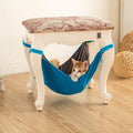 CozyCat hanging cat hammock bed in breathable cotton attached to wooden chair legs