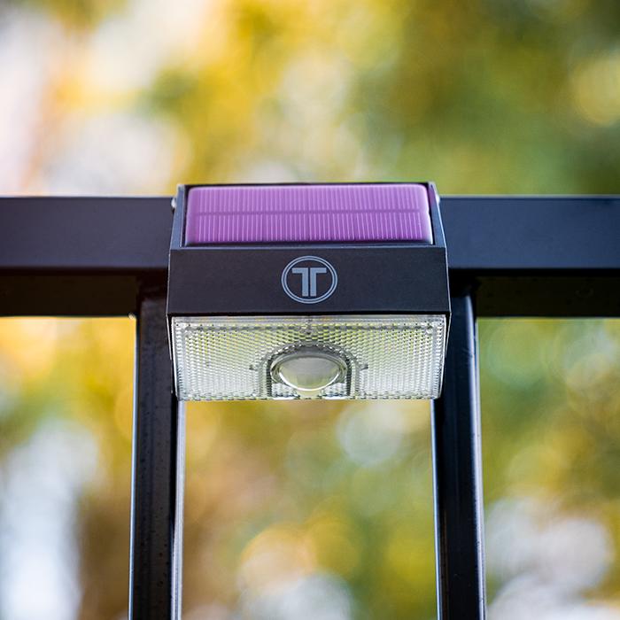 Cree-1000 outdoor solar security light with motion sensor and bright LED illumination in black composite housing — view 2