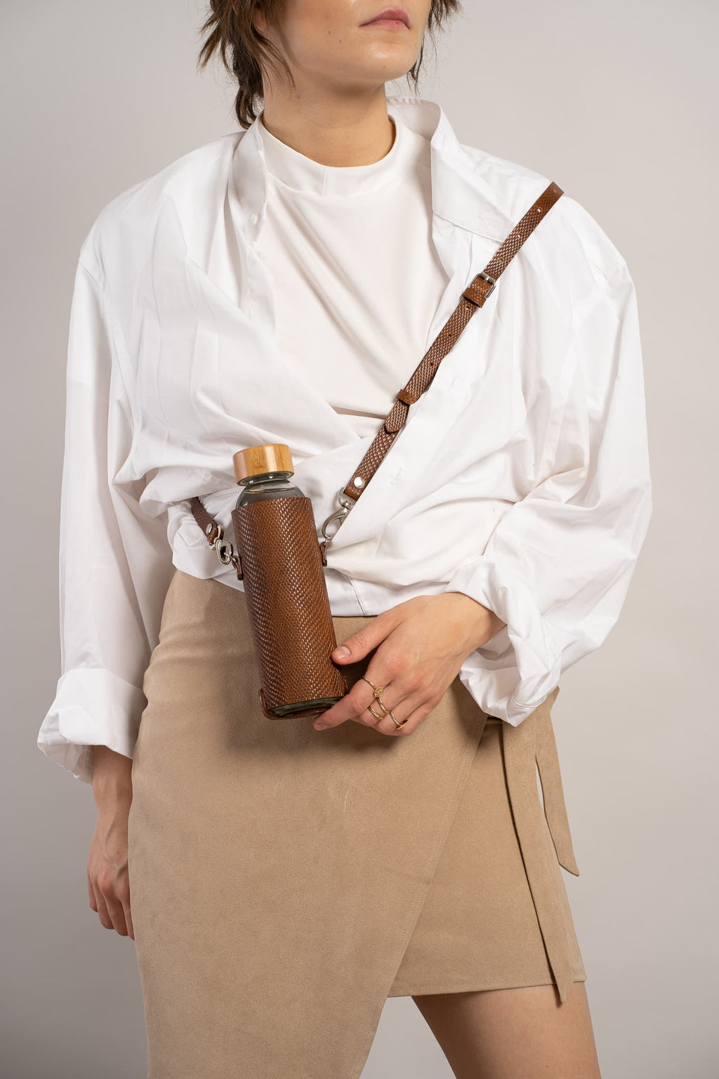 Leather water bottle holder with strap and glass bottle-4