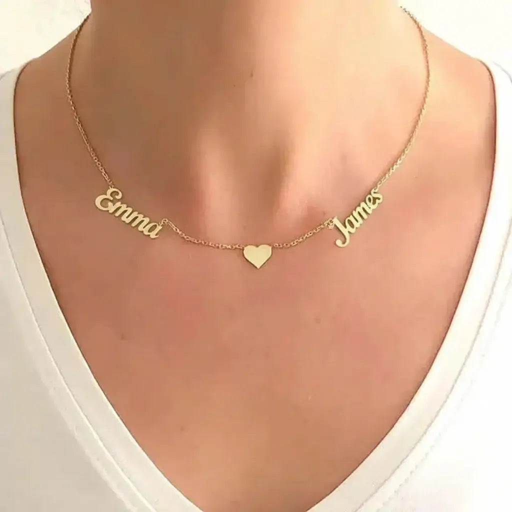Personalized gold nameplate necklace featuring three custom name charms on an adjustable chain. — view 5