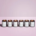 Hand-poured eco soy wax scented candle displaying naturally blended essential oils and a cotton wick