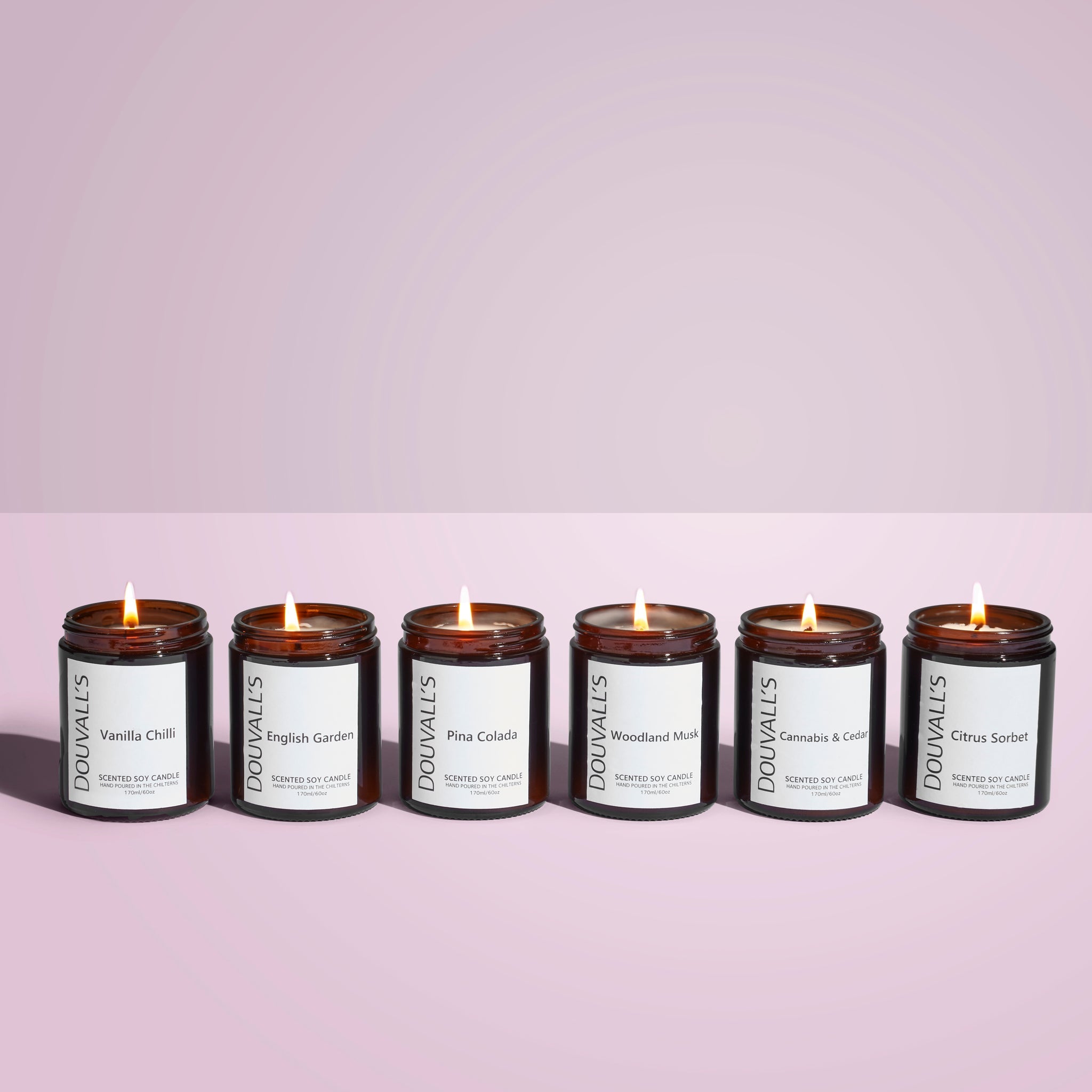 Hand-poured eco soy wax scented candle displaying naturally blended essential oils and a cotton wick