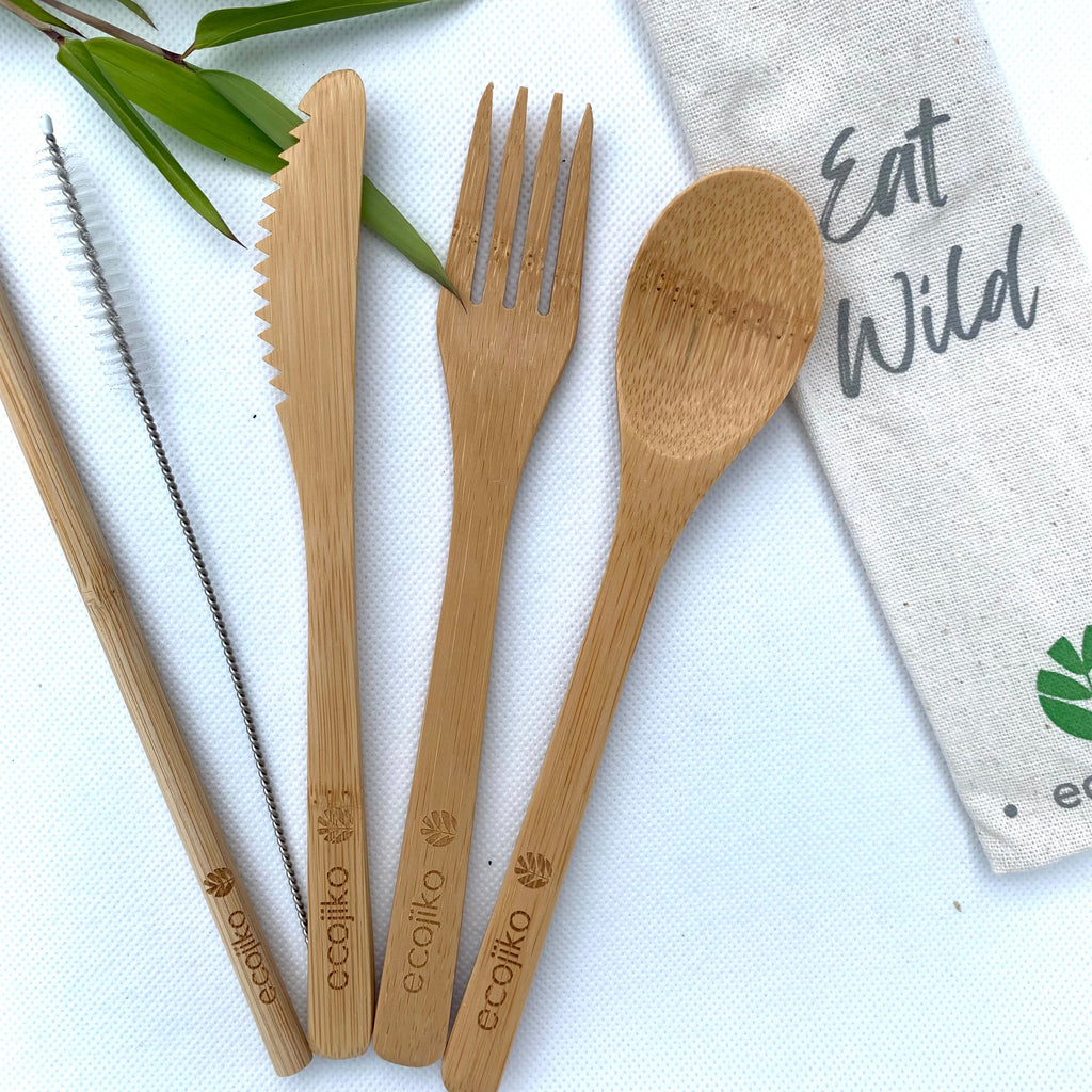 Reusable bamboo travel cutlery set with fork knife spoon straw brush and textured jute bag — view 3
