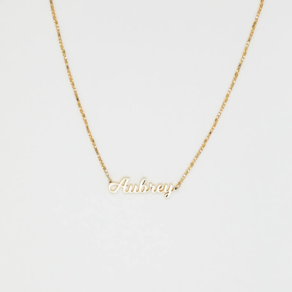 Personalized name necklace in elegant script font with a delicate gold chain and clasp. — view 4