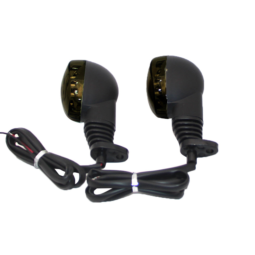 Smoke lens amber LED motorcycle turn signal indicator lights with connecting cables on white background — view 4