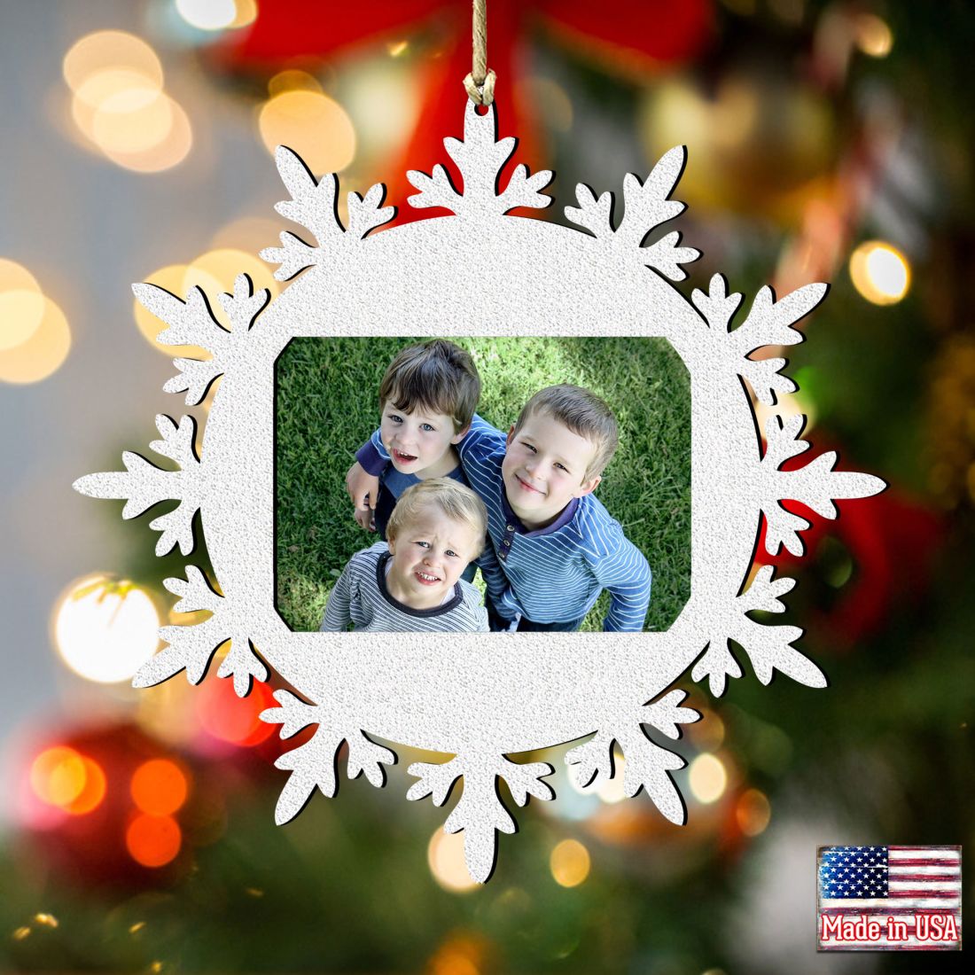 Wooden snowflake Christmas photo ornament featuring a central picture frame for festive tree decorations — view 3